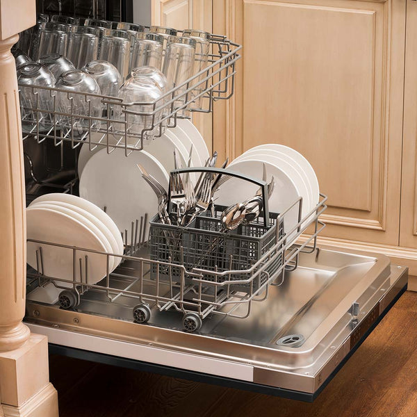 Built-in top control dishwasher with dishes and utensils on bottom rack and glassware on top rack