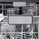 ZLINE Autograph Edition 24 in. 3rd Rack Top Touch Control Tall Tub Dishwasher in Stainless Steel with Champagne Bronze Handle, 45dBa (DWMTZ-304-24-CB) close-up, ZLINE logo on dish rack.