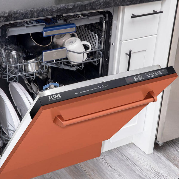 ZLINE 24 in. Tallac Series 3rd Rack Dishwasher with Copper Panel and Traditional Handle, 51dBa (DWV-C-24) half open with dishes inside in a kitchen with white cabinets and stone countertops.